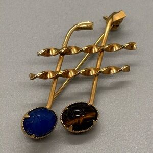 Scarab and 12 KGF Music Notes Brooch with Blue and Brown Stones